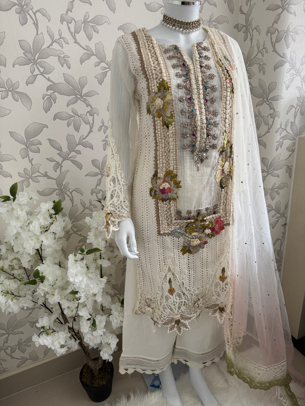 UJAALA….. Elegant White Embroidered Pakistani Suit with net Dupatta