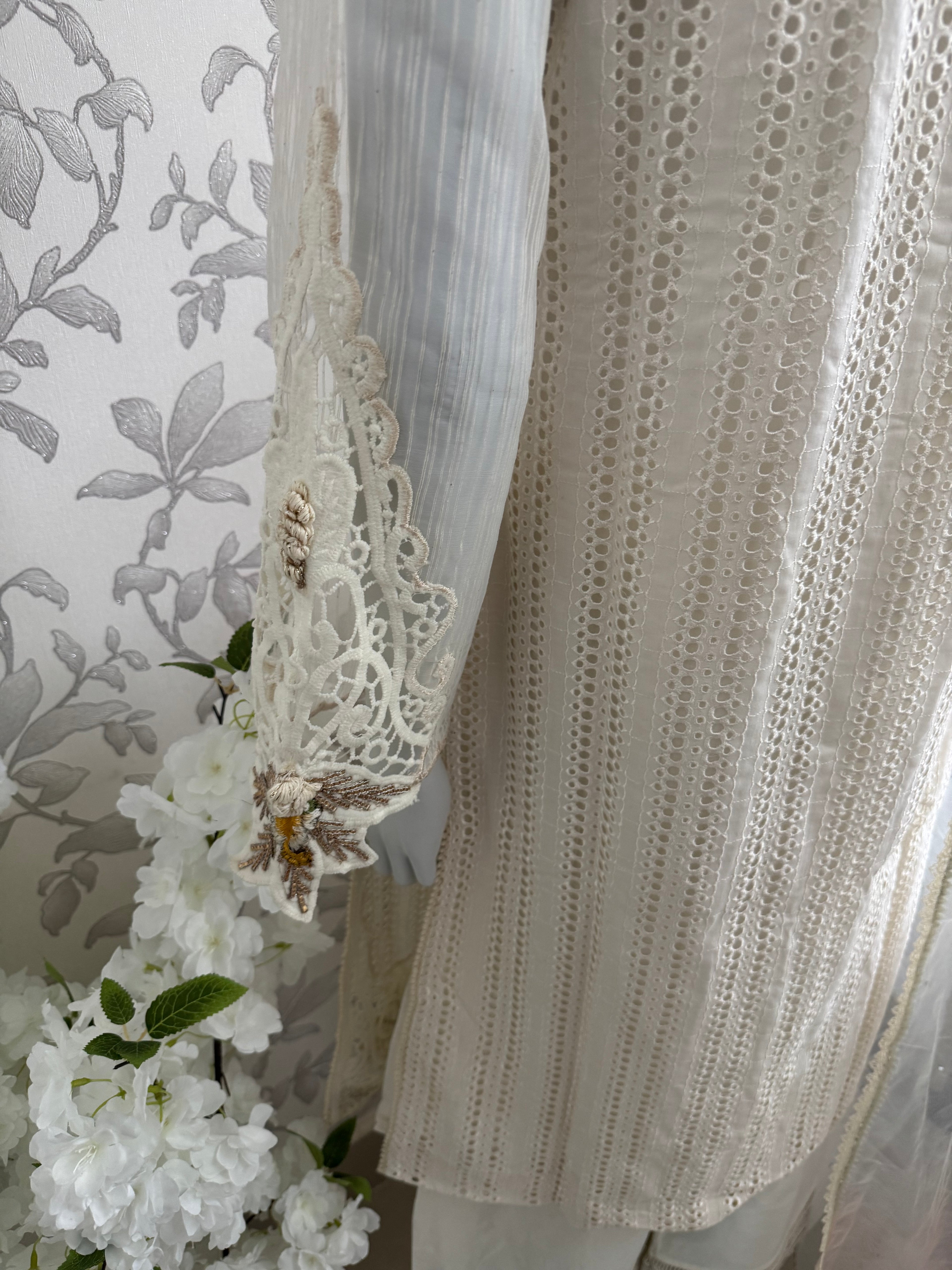 UJAALA….. Elegant White Embroidered Pakistani Suit with net Dupatta