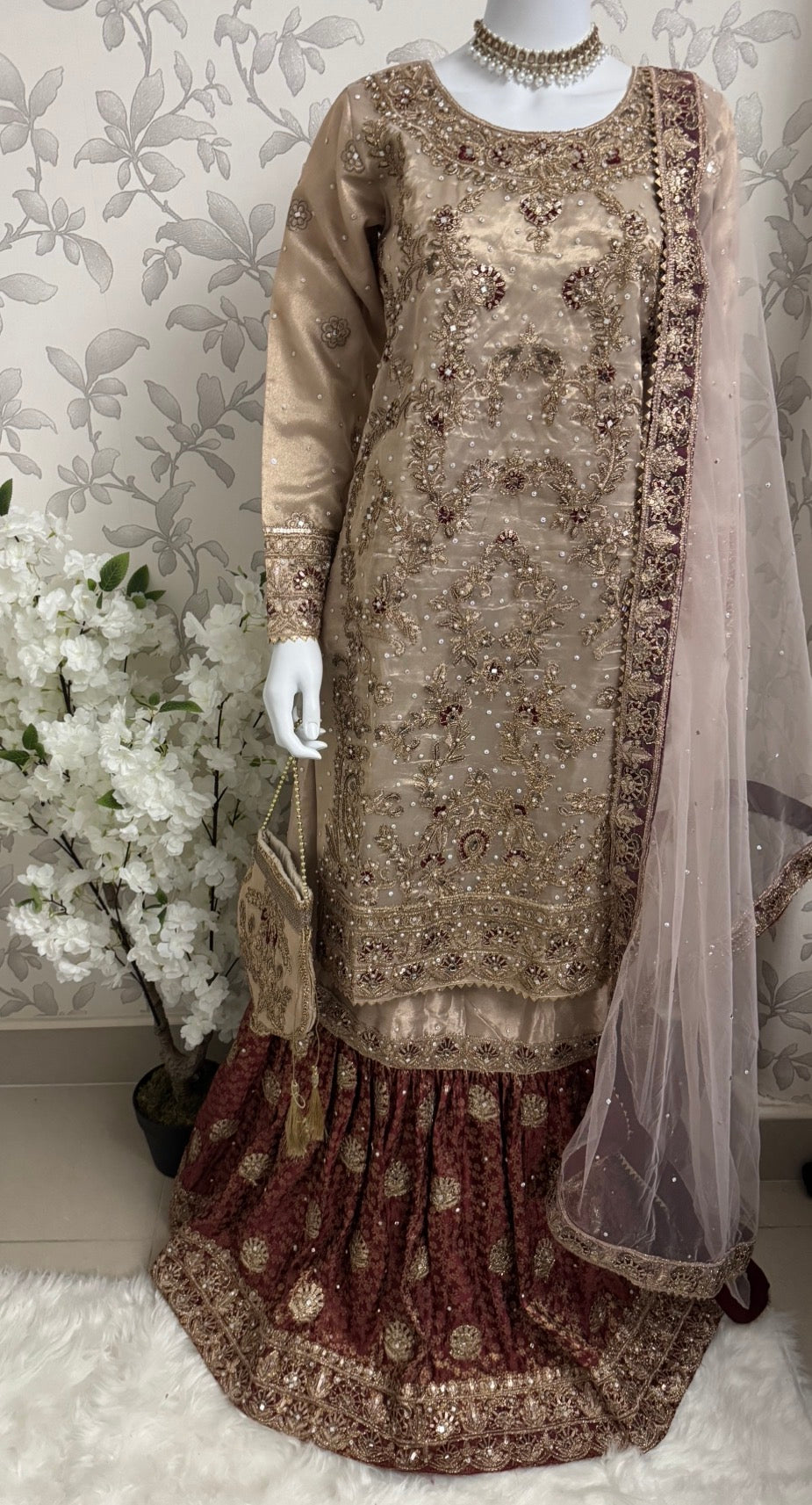 AMAIRA…. Champagne Gold & Maroon Embroidered Pakistani Gharara Suit with Net Dupatta