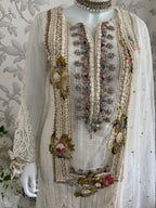 UJAALA….. Elegant White Embroidered Pakistani Suit with net Dupatta