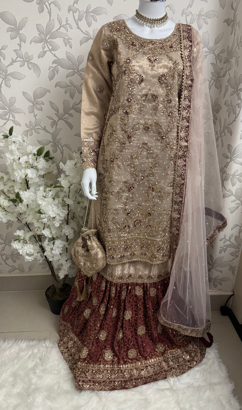AMAIRA…. Champagne Gold & Maroon Embroidered Pakistani Gharara Suit with Net Dupatta