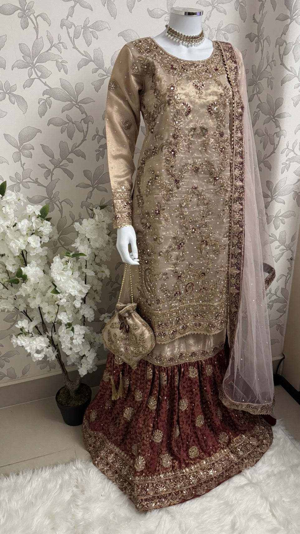 AMAIRA…. Champagne Gold & Maroon Embroidered Pakistani Gharara Suit with Net Dupatta