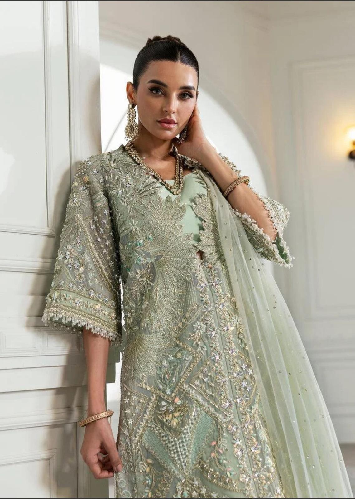 Crimson (inspired) wedding collection …beautiful heavy embroidered organza shirt with silk sharara and net embroidered duppatta…