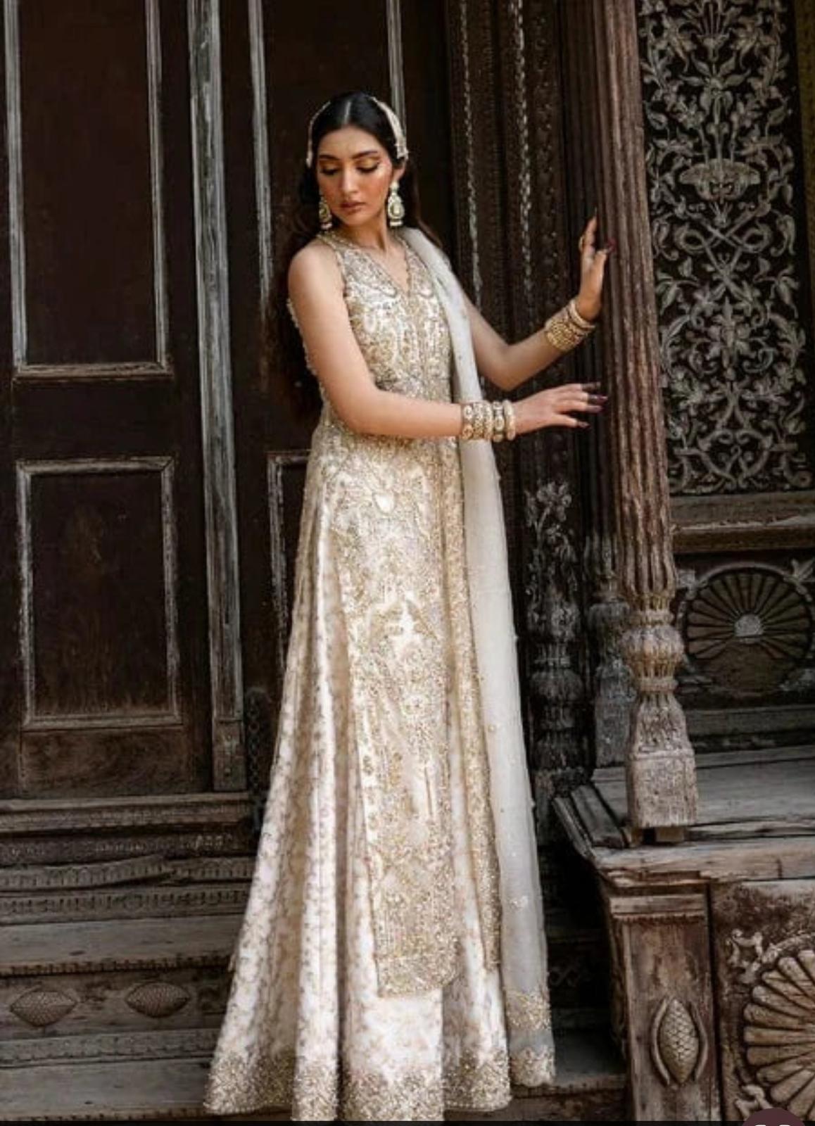 Kanwal Malik NISHA( inspired)- 3 pcs heavy embroidered soft organza shirt and sharara suit..Beige