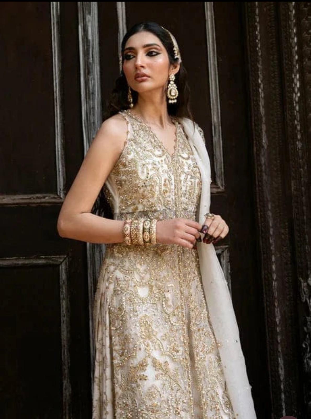 Kanwal Malik NISHA( inspired)- 3 pcs heavy embroidered soft organza shirt and sharara suit..Beige